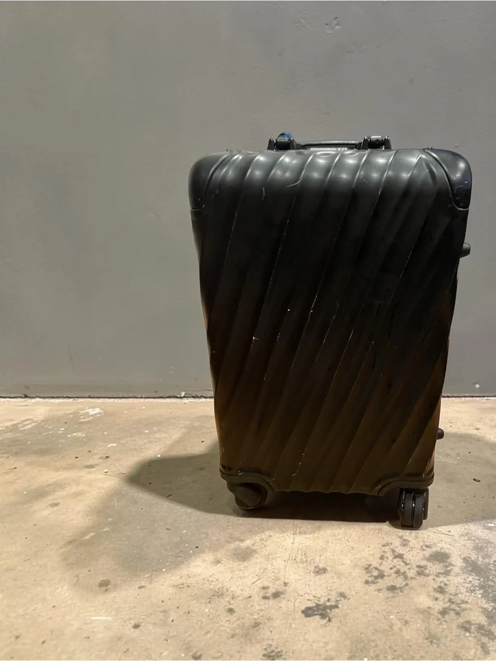 Tumi Black Diagonal-Rib Hard-Shell Spinner Carry-On